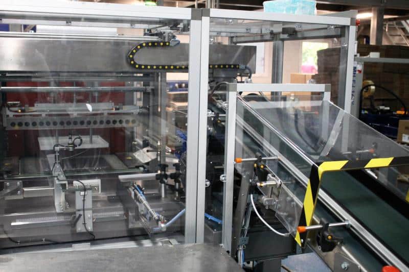 Automatisch bundelverpakken van kartonnen doosjes diepvriesgroenten bij PolarPack 4